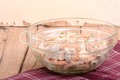 Fresh salad on glass bowl