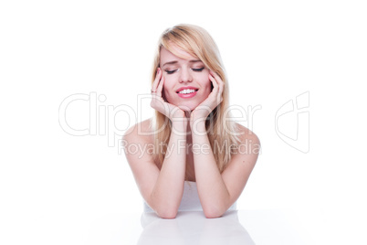 Woman with Eyes Closed and Head Resting in Hands