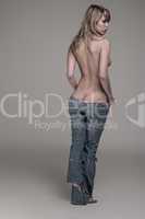 Topless Woman in Tattered Jeans Showing Ass