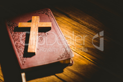 Crucifix icon resting on the bible