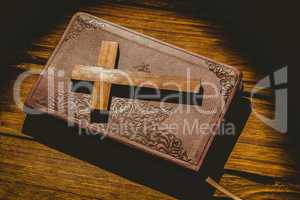 Crucifix icon on the bible
