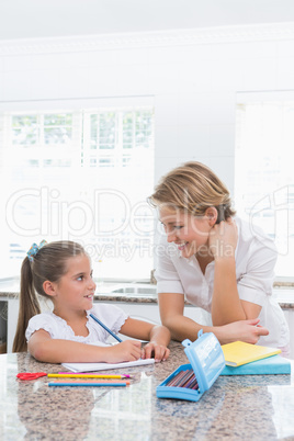 Mother and daughter doing homework