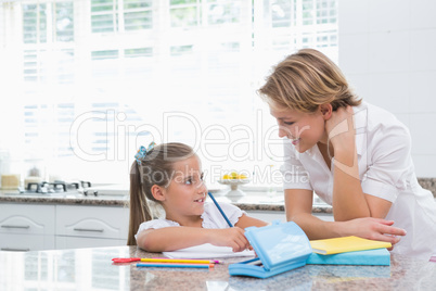 Mother and daughter doing homework