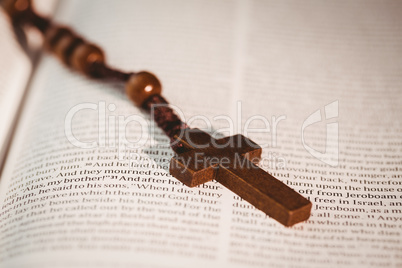 Open bible with rosary beads