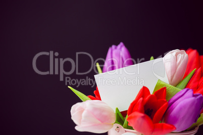 Bunch of tulips and white card