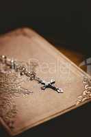 Rosary beads with bible