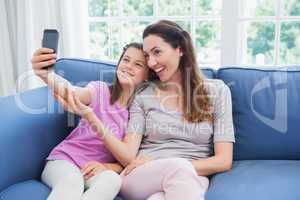 Mother and daughter taking a selfie