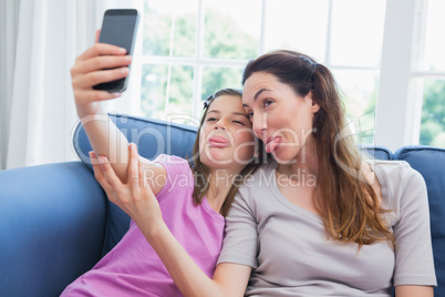 Mother and daughter taking a selfie