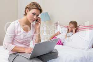Daughter being ignored by busy mum
