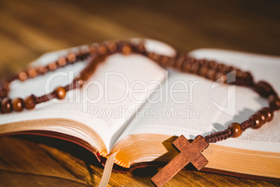 Open bible with rosary beads