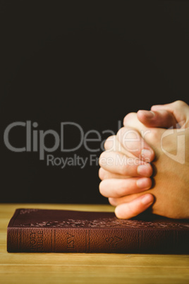 Man praying with his bible