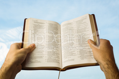 Man praying with his bible