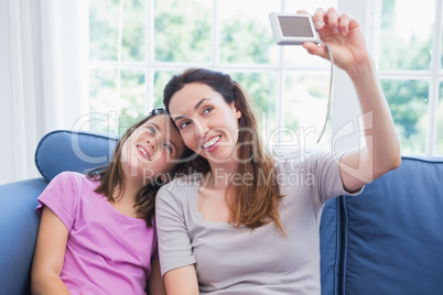 Mother and daughter taking a selfie