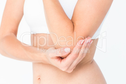 Woman suffering from elbow pain