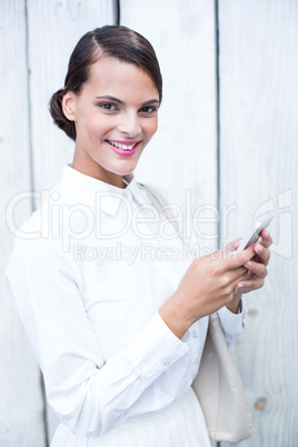 Pretty woman using her smartphone