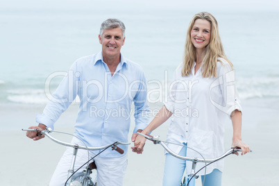 Happy couple cycling together