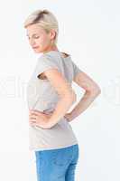 Blonde woman suffering from back pain