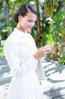 Pretty woman using her smartphone