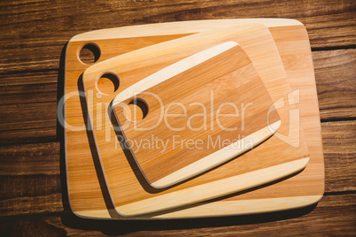 Chopping boards on wooden table