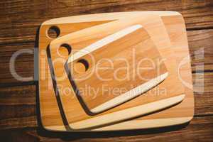 Chopping boards on wooden table