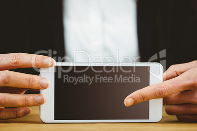 Businesswoman using her tablet pc