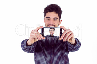 Casual man taking a selfie