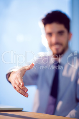 Businessman offering to shake hands