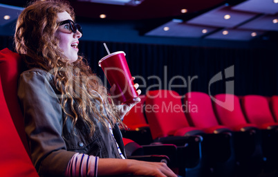 Young woman watching a 3d film Young woman watching a 3d film