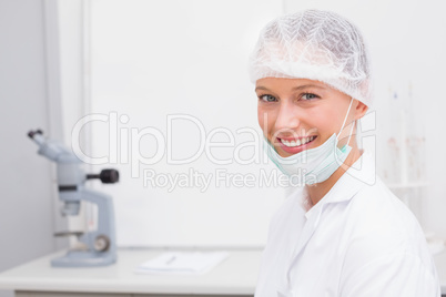 Happy scientist smiling at camera Happy scientist smiling at camera