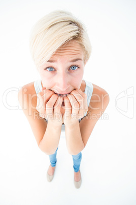 Stressed woman biting her nails