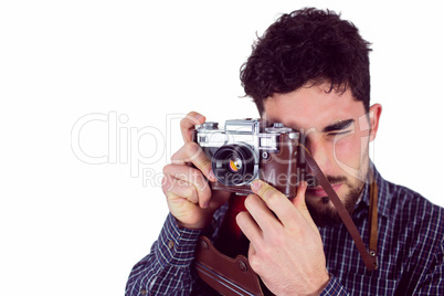 Casual man taking a photo