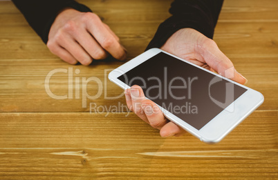 Businesswoman using her tablet pc