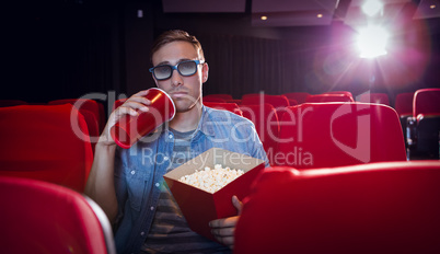 Young man watching a 3d film