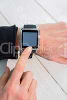 Businesswoman using a smart watch