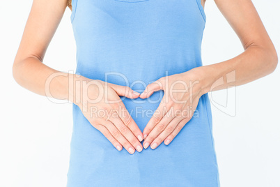 Casual woman touching her belly