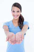 Happy woman presenting her hands