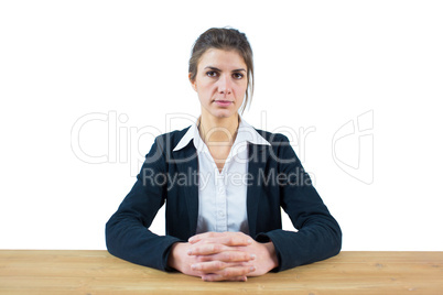 Businesswoman frowning at the camera