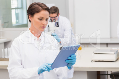 Focus scientist using tablet pc