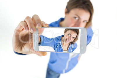 Casual brunette taking a selfie