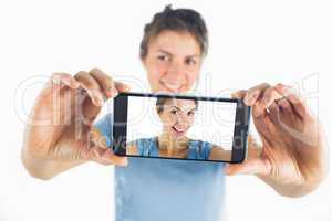 Casual brunette taking a selfie