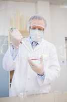 Scientist doing experimentations in petri dish