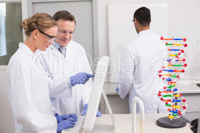 Scientist working with computer