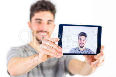 Casual man taking a selfie