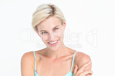 Beautiful blonde woman smiling at camera