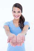 Happy woman presenting her hands