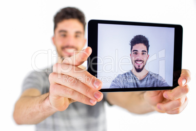 Casual man taking a selfie