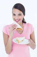 Beautiful woman eating sandwich