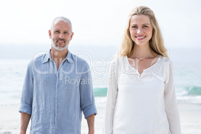 Happy couple smiling at camera