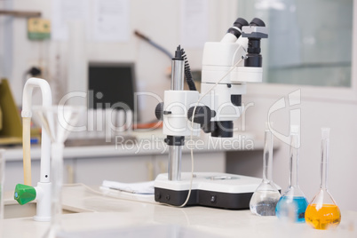 Microscope and beakers