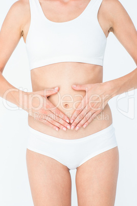 Woman suffering from stomach pain